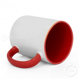White mug with red interior and handle