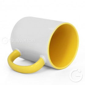 White mug with yellow interior and handle