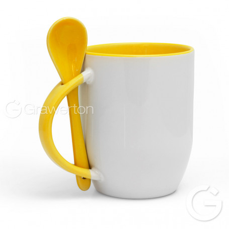 White mug KAZO with yellow interior, handle and teaspoon